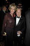 Marjorie Reed Gordon and Arnold Scaasi  at the Casita Maria  70th. Anniversary Fiesta  at the Plaza Hotel  on October 19, 2004 in Manhattan, N.Y. photo by Rob Rich copyright 2004 516-676-3939  robwayne1@aol.com
