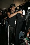 Douglas Says  at the Lloyd Klein Fashion show at  Bryant Park in Manhattan, N.Y. on September 11, 2004.photo by Rob Rich copyright 2004<br>516-676-3939<br>robwayne1@aol.com