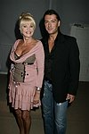 Ivana Trump and Rossano Rubicondi at the Lloyd Klein Fashion show at  Bryant Park in Manhattan, N.Y. on September 11, 2004.photo by Rob Rich copyright 2004<br>516-676-3939<br>robwayne1@aol.com
