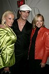 High Voltage, Lloyd Klein, and Katie Couric   at the Lloyd Klein Fashion show at  Bryant Park in Manhattan, N.Y. on September 11, 2004.photo by Rob Rich copyright 2004<br>516-676-3939<br>robwayne1@aol.com