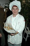 Noah Millrod from Eastern Suffolk Boces  at the Peconic Bay Winery 3rd. Annual Thanksgiving Barrell Tasting on 11-21-04 in Cutchogue, N.Y., honoring Larry Forgione and benefitting the NYIT Culinary Arts Program.<br>photo by Rob Rich copyright 2004 516-676-3939 robwayne1@aol.com