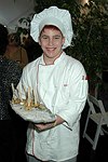 Noah Millrod from Eastern Suffolk Boces  at the Peconic Bay Winery 3rd. Annual Thanksgiving Barrell Tasting on 11-21-04 in Cutchogue, N.Y., honoring Larry Forgione and benefitting the NYIT Culinary Arts Program.<br>photo by Rob Rich copyright 2004 516-676-3939 robwayne1@aol.com