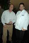 Scott Rella (Fear no Ice) and Michael Meehan and Culinary Director from Peconic Bay  at the Peconic Bay Winery 3rd. Annual Thanksgiving Barrell Tasting on 11-21-04 in Cutchogue, N.Y., honoring Larry Forgione and benefitting the NYIT Culinary Arts Program.<br>photo by Rob Rich copyright 2004 516-676-3939 robwayne1@aol.com