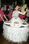 Lavina at the dessert table at the Volunteers of America fundraiser at the Boat House in  Central Park on June 8, 2004 in N.Y.C.<br>photo by Rob Rich copyright 2004<br>516-676-3939<br>robwayne1@aol.com